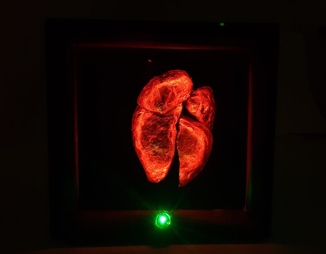 BEAT — a mechatronic copper heart installation, glowing warm amber