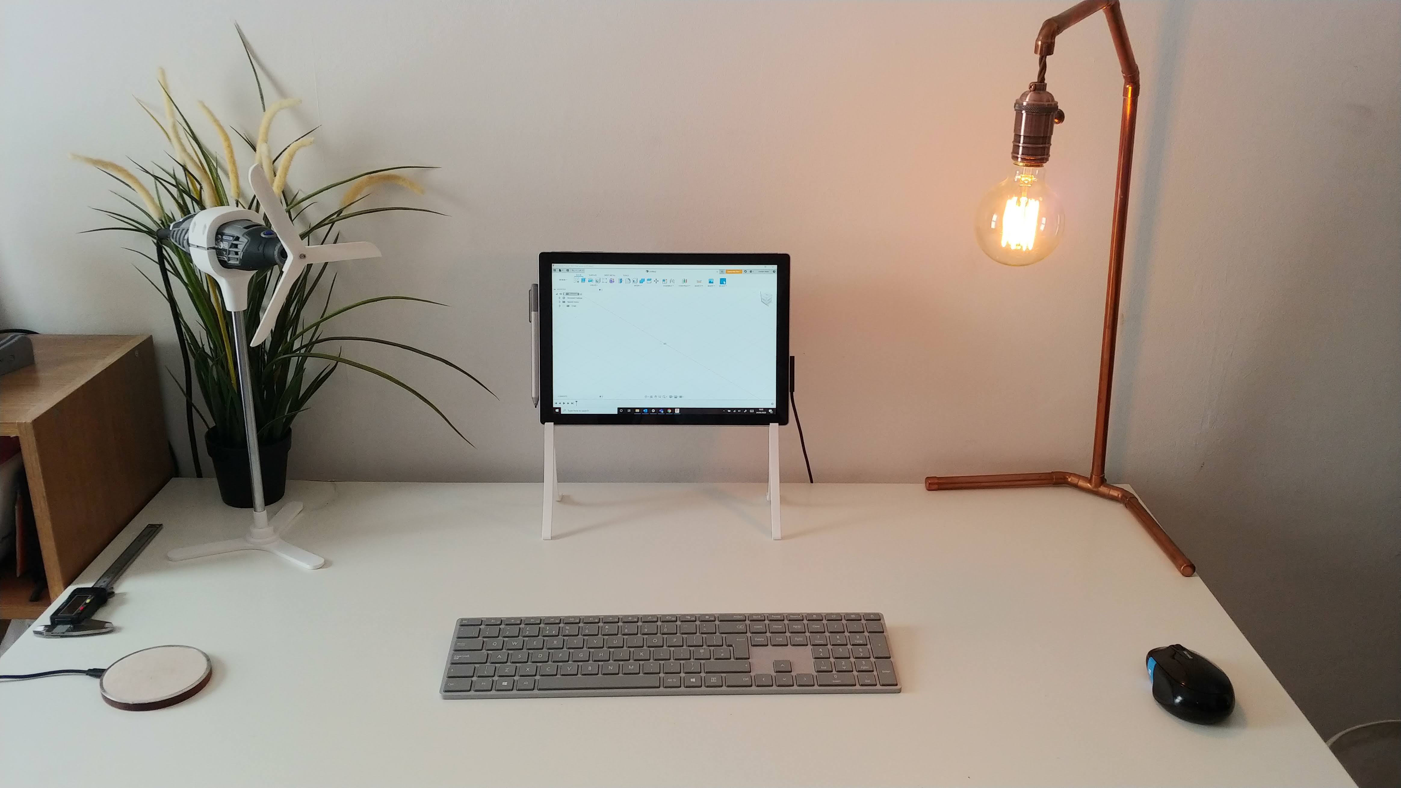 A Dremel 3000 rotary tool converted into a 3D-printed desk fan